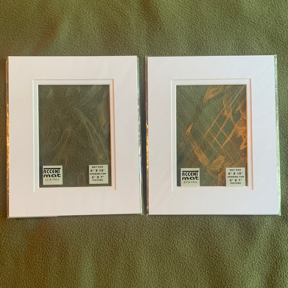 NIP Nicole acid free white accent mats. 8” x 10” opening for 5” x 7” picture.